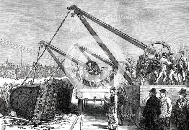 The Railway Accident at Abbotts Ripton, Huntingdon: raising an engine from the wrecked train, 1876. Creator: Unknown.