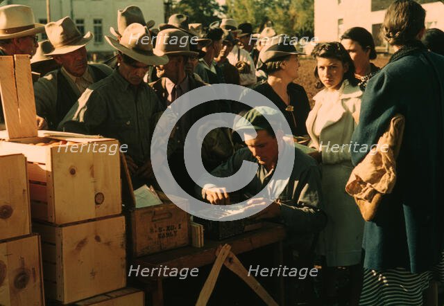 Distributing surplus commodities, St. Johns, Ariz., 1940. Creator: Russell Lee.