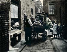 A move in 'Slumopolis', London, c1901 (1901). Artist: Unknown.