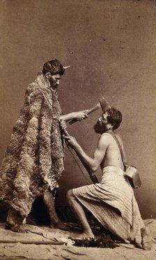 Two Maori men, simulating armed attack with a hatchet and a spear(?), c1880s. Creator: Unknown.