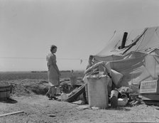Young family just arrived from Arkansas camped along the road, Imperial Valley, California, 1937. Creator: Dorothea Lange.