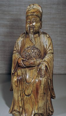 Ivory Chinese figurine of a Ming dynasty official, 17th century.