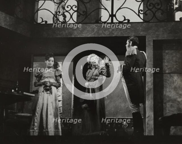 Two woman and a man, standing, 1938. Creator: Unknown.