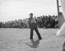 Ball game, Shafter migrant camp, California, 1938. Creator: Dorothea Lange.