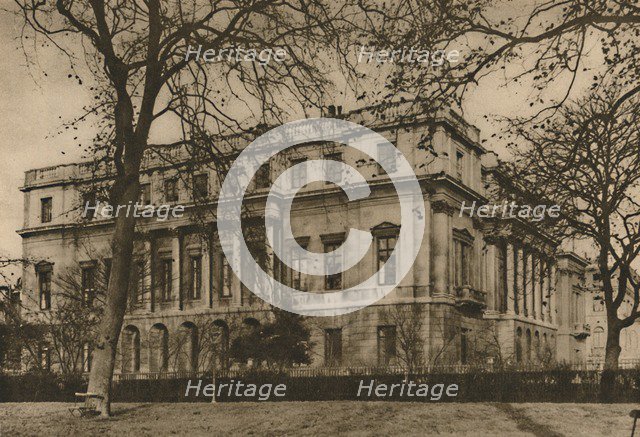 'A View of London Museum at Lancaster House Through The Green Park Railings', c1935. Creator: Donald McLeish.