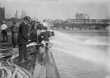 Testing stream from motor fire engines, 1913. Creator: Bain News Service.