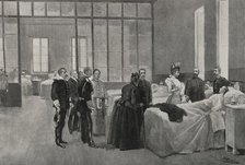 Spanish-American War (1898): Queen Maria Christina visiting wounded soldiers, Madrid, Spain, 1898.  Creator: Enrique Laporta Valor.