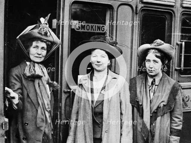 Emmeline, Christabel and Sylvia Pankhurst, Waterloo Station, London, 1911. Artist: Unknown