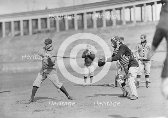 Joe Connolly at Bat, Jack Calvo at Right, Washington Al, at University of Virginia..., ca. 1913. Creator: Harris & Ewing.