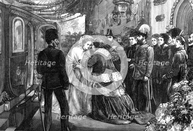 The Queen meeting the Duke and Duchess of Edinburgh at Windsor Railway Station, 1874. Creator: Unknown.