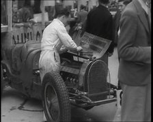 Man Fixing a Racing Car, 1936. Creator: British Pathe Ltd.