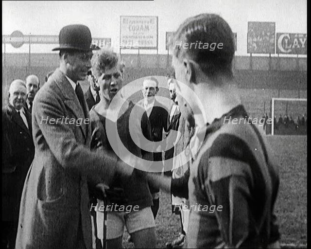 Prince Albert, Duke of York, Shaking Hands With Football Team at West Ham Before a Match, 1922.  Creator: British Pathe Ltd.