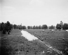 Battalion firing, kneeling, M[ichigan] M[ilitary] A[cademy], Orchard Lake, Michigan, c1900. Creator: Unknown.