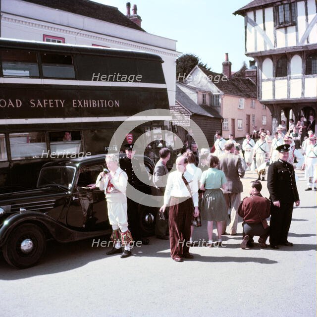 Morris dancers and policemen at a road safety exhibition, Essex, c1955.  Creator: Arthur Charles Kirby Ware.