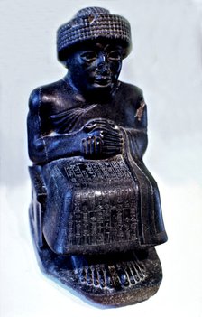 Seated statue of Gudea, prince of Lagash city', one of many Sculptures dedicated to this ruler wh…