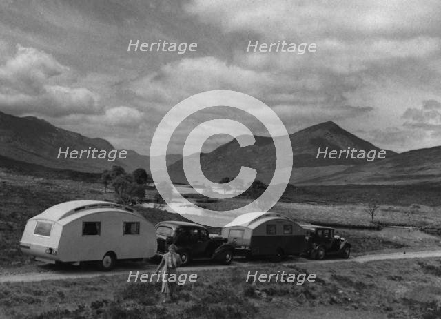 1936 Austin Twenty with caravan and 1936 Oldsmobile Eight with caravan. Creator: Unknown.