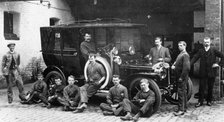 Men with a 1911 Daimler, c1911. Artist: Unknown