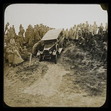 A six-wheeled car, possibly an early Morris Commercial 6x4, driving down a slope..., 1926-1929.  Creator: Norman Kingsley Harrison.