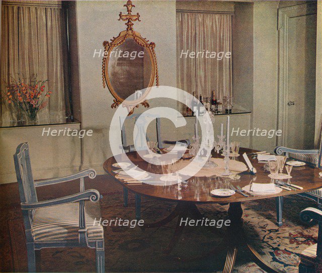 Dining room of the flat designed by Herman Schryver in Grosvenor Square, London, 1936. Artist: Unknown