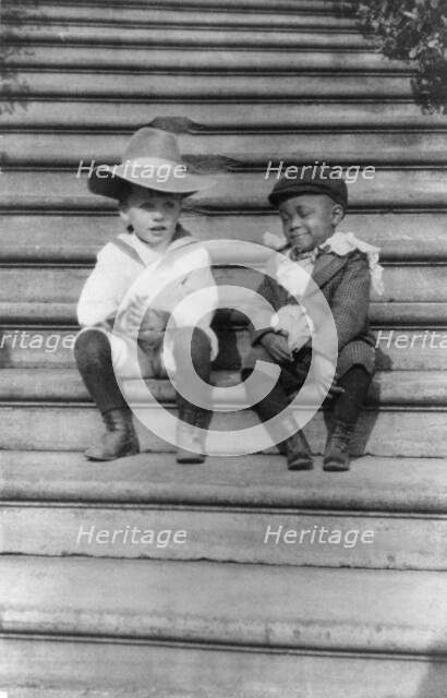 Quentin Roosevelt and Roswell Newcomb Pinckney seated on steps, c1902 June 17. Creator: Frances Benjamin Johnston.