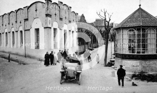 A car in the Promenade of Castellterçol village (Barcelona) in the early 20th century, photograph…