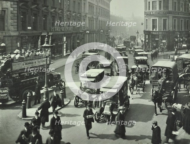 Pedestrians and traffic, Victoria Street, London, April 1912. Artist: Unknown.