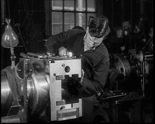 A Man Working in a Factory, 1940. Creator: British Pathe Ltd.