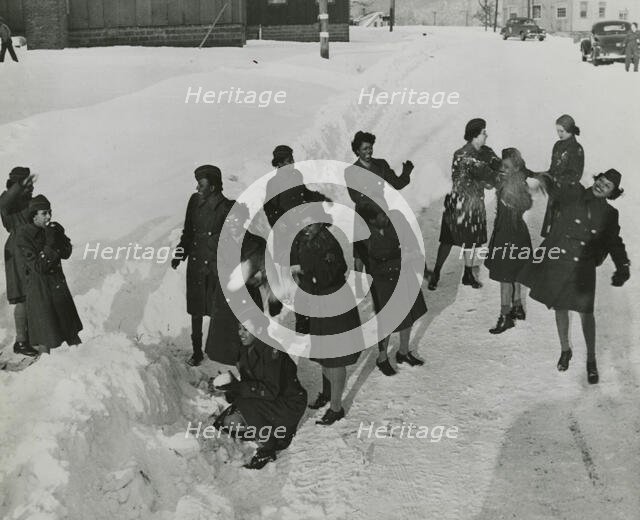 African American members of the Women's Army Corps standing in the snow and..., New York, 1946. Creator: Unknown.