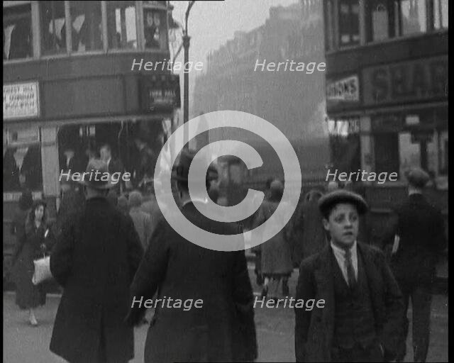People Walking Around the Streets of London, 1930s. Creator: British Pathe Ltd.