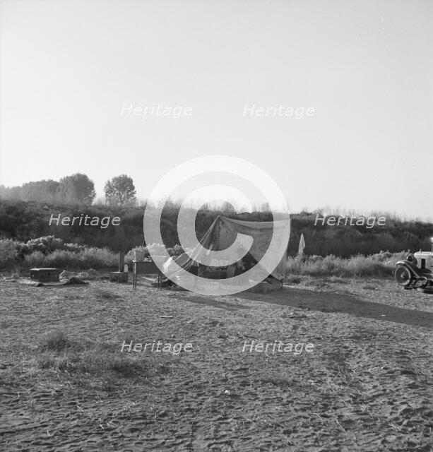 Young family on ditch bank, waiting to enter... camp (FSA), Merrill, Klamath County, Oregon, 1939. Creator: Dorothea Lange.