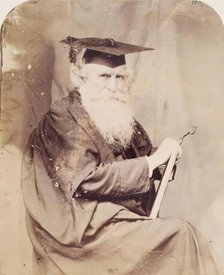 Thomas Combe in Cloak and Mortar Board, from an album compiled by John Everett Millais, 30 June 1860 Creator: Lewis Carroll.