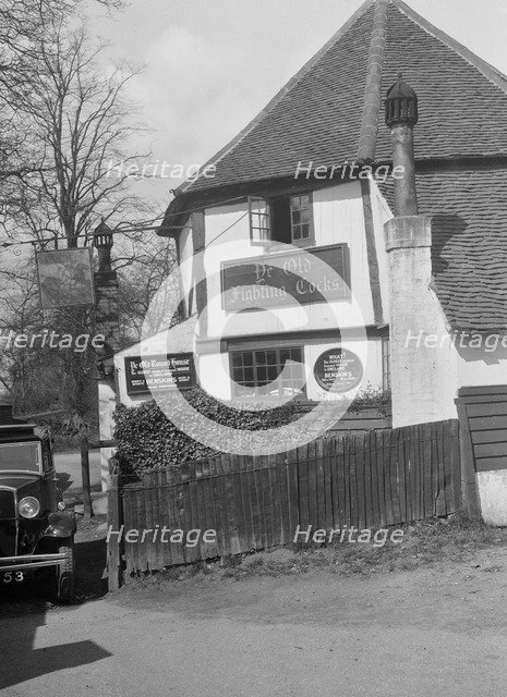 Kitty Brunell's Standard 16 outside Ye Olde Fighting Cocks inn, St Albans, Hertfordshire, 1930s. Artist: Bill Brunell.