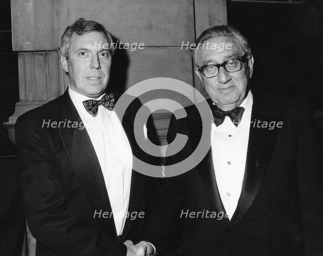 Jeremy Freedman, Chairman of Glasgow JIA, with Dr Henry Kissinger, politician and economist. Artist: Unknown