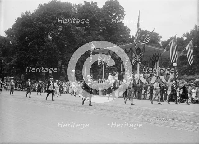 Preparedness Parade - Colonial Unit Passing Reviewing Stand, 1916. Creator: Harris & Ewing.