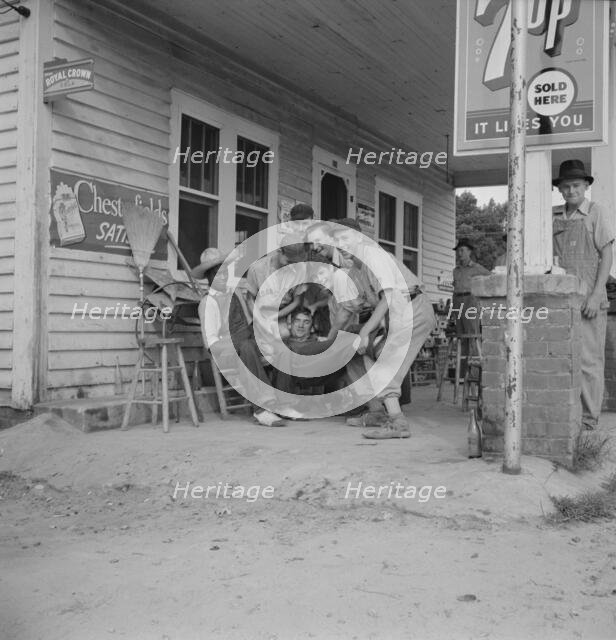 Rural filling station becomes community center..., near Chapel Hill, North Carolina, 1939. Creator: Dorothea Lange.