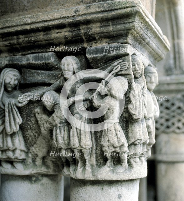 Detail of a capital in the cloister of the collegiate.