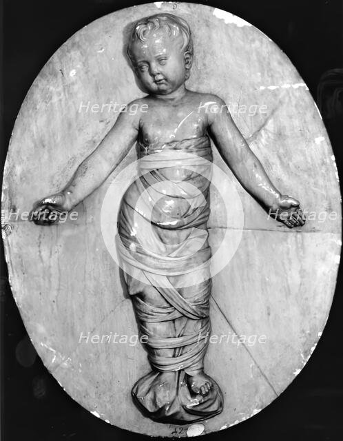 Medallion of a Baby in Swadling Clothes from the Ospedali degli Innocenti, Florence, c1500. Creator: Unknown.