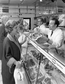 Scene inside a butcher's shop, Doncaster, South Yorkshire, 1965. Artist: Michael Walters