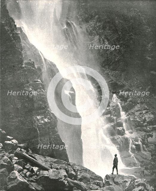 A waterfall in the hill district, Dehra Dun, India, 1895.  Creator: W & S Ltd.