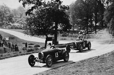 'Thrilling racing in rural England: Bugattis at Donington', 1937. Artist: Unknown.
