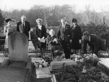 Lady Churchill and family lay a wreath on the grave of Sir Winston Churchill, Bladon, 1974. Artist: Unknown