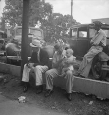 Chatham County farmers in town on Saturday afternoon, Pittsboro, North Carolina, 1939. Creator: Dorothea Lange.