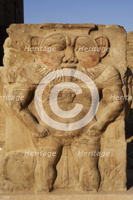 Relief of the god Bes, capital of column, Temple of Hathor, Dendera, Egypt, 2003. Creator: LTL.