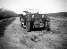 Kitty Brunell road testing a Riley 9 tourer, c1930.  Artist: Bill Brunell.
