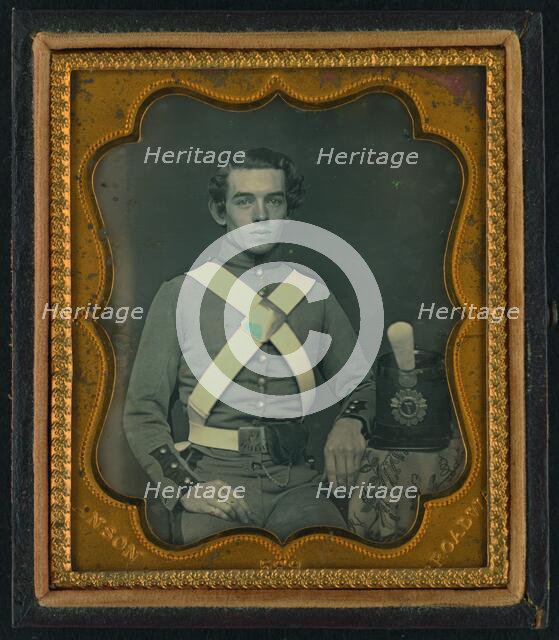 Unidentified soldier of 7th New York Infantry Regiment in uniform graphic /, between 1861 and 1863. Creator: Rufus Anson.