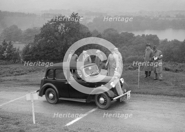 Austin Cambridge saloon of T Norton competing in the South Wales Auto Club Welsh Rally, 1937 Artist: Bill Brunell.