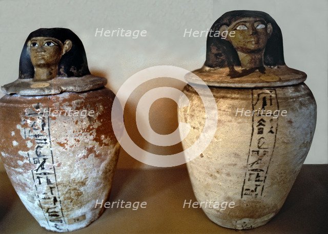 Canopic vase in clay.