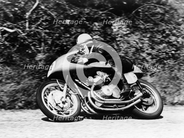 John Surtees on an MV Agusta, Waterworks Corner, Isle of Man Senior TT, 1956. Artist: Unknown