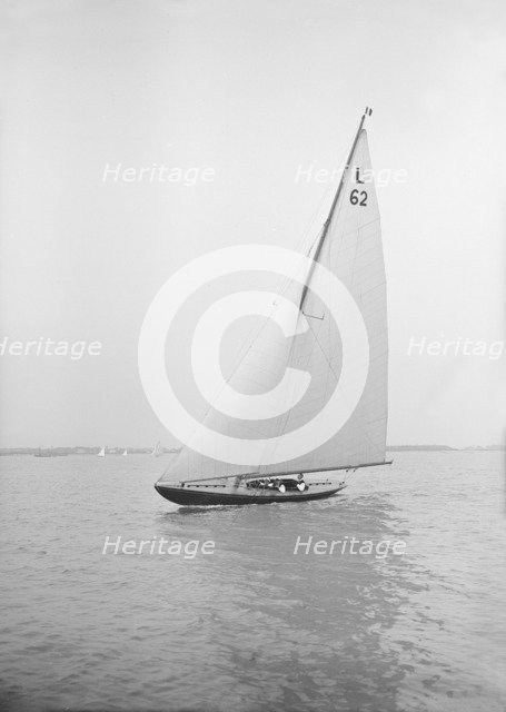 The 6 Metre 'Mosquito' sailing close-hauled, 1913. Creator: Kirk & Sons of Cowes.