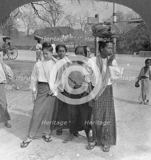 Woman and servants going to a market, Mandalay, Burma, 1908. Artist: Stereo Travel Co